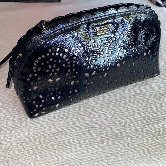 Victoria's Secret Handbags - Victoria's Secret Black Laser-Cut Cosmetic pouch